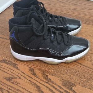 Air Jordan 11 Retro Black and Blue Athletic Sneakers